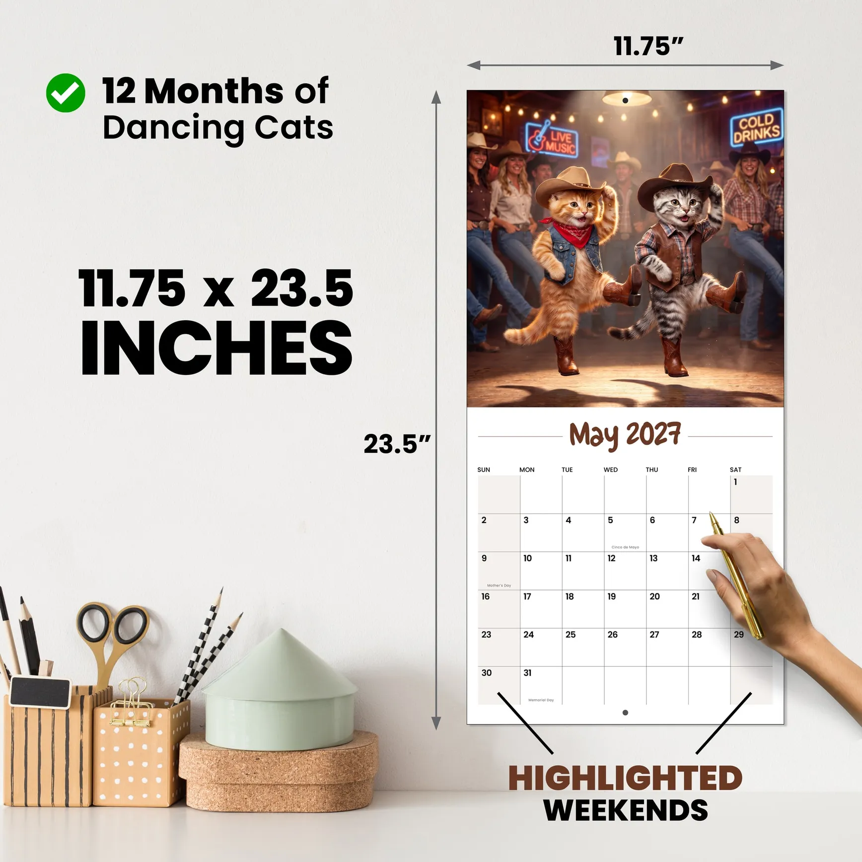 Dancing Cats wall calendar open on the wall, a cat mid-move, 11.75 by 23.5 inches